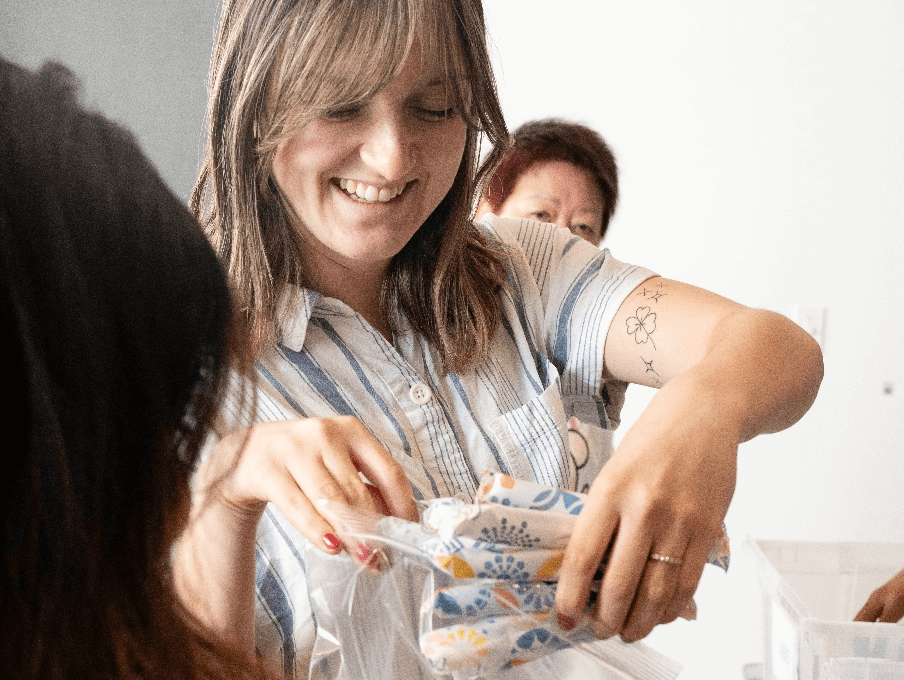 A woman distributing tampons