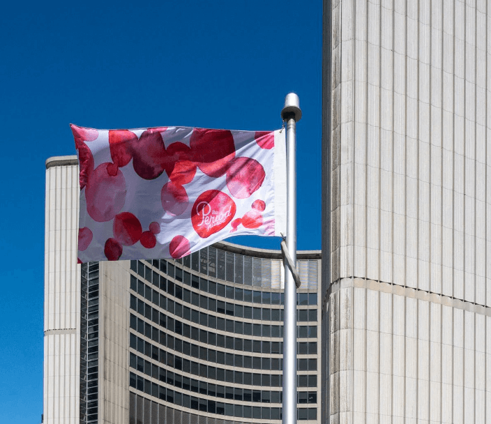 Flag representing menstrual health is raised