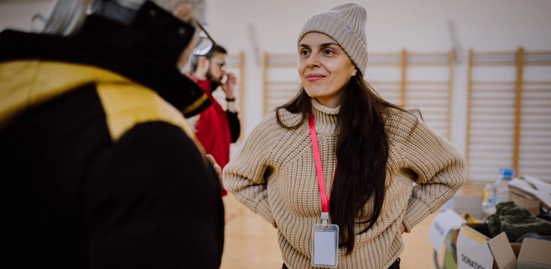 A female staff member looking at a participant