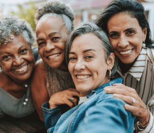 A diverse set of seniors smiling